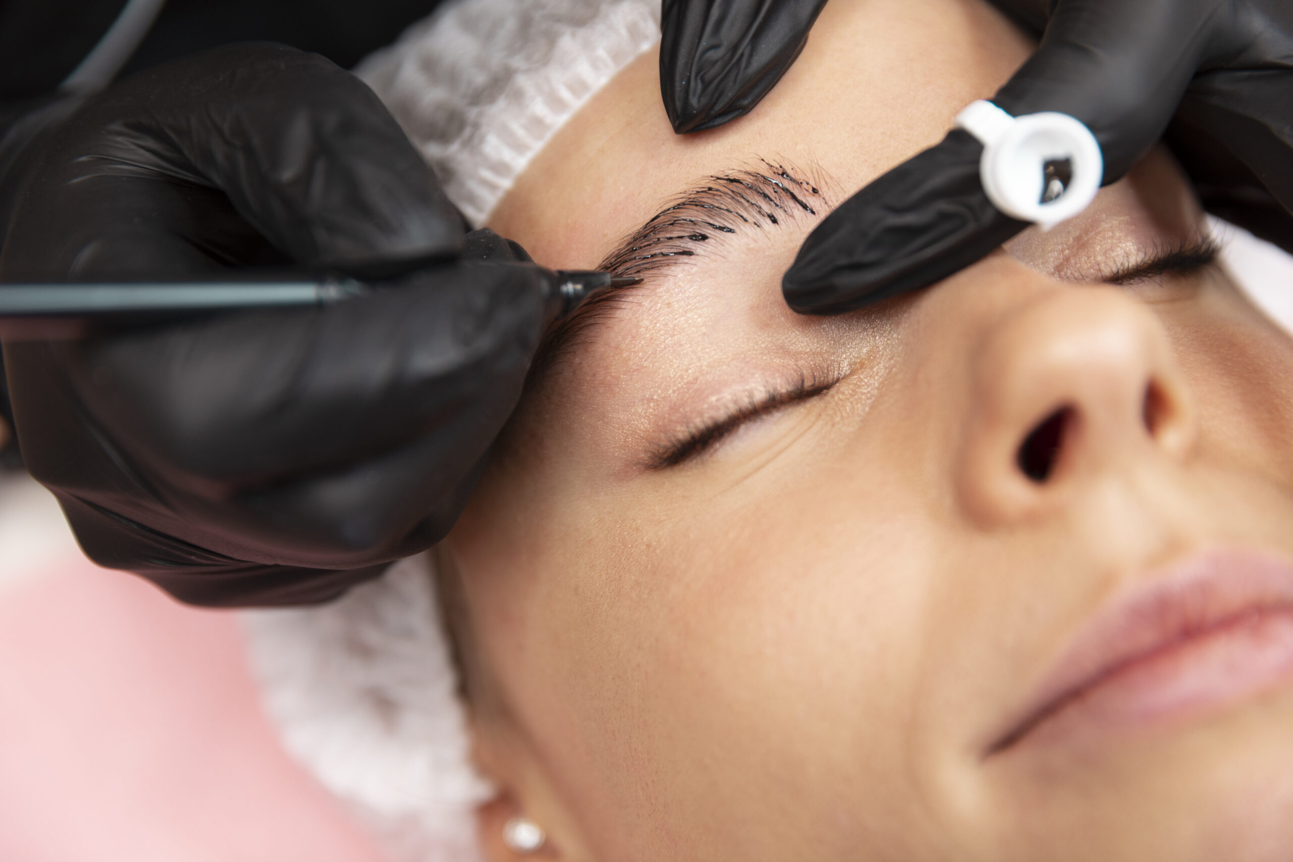 beautiful-young-woman-going-through-microblading-treatment