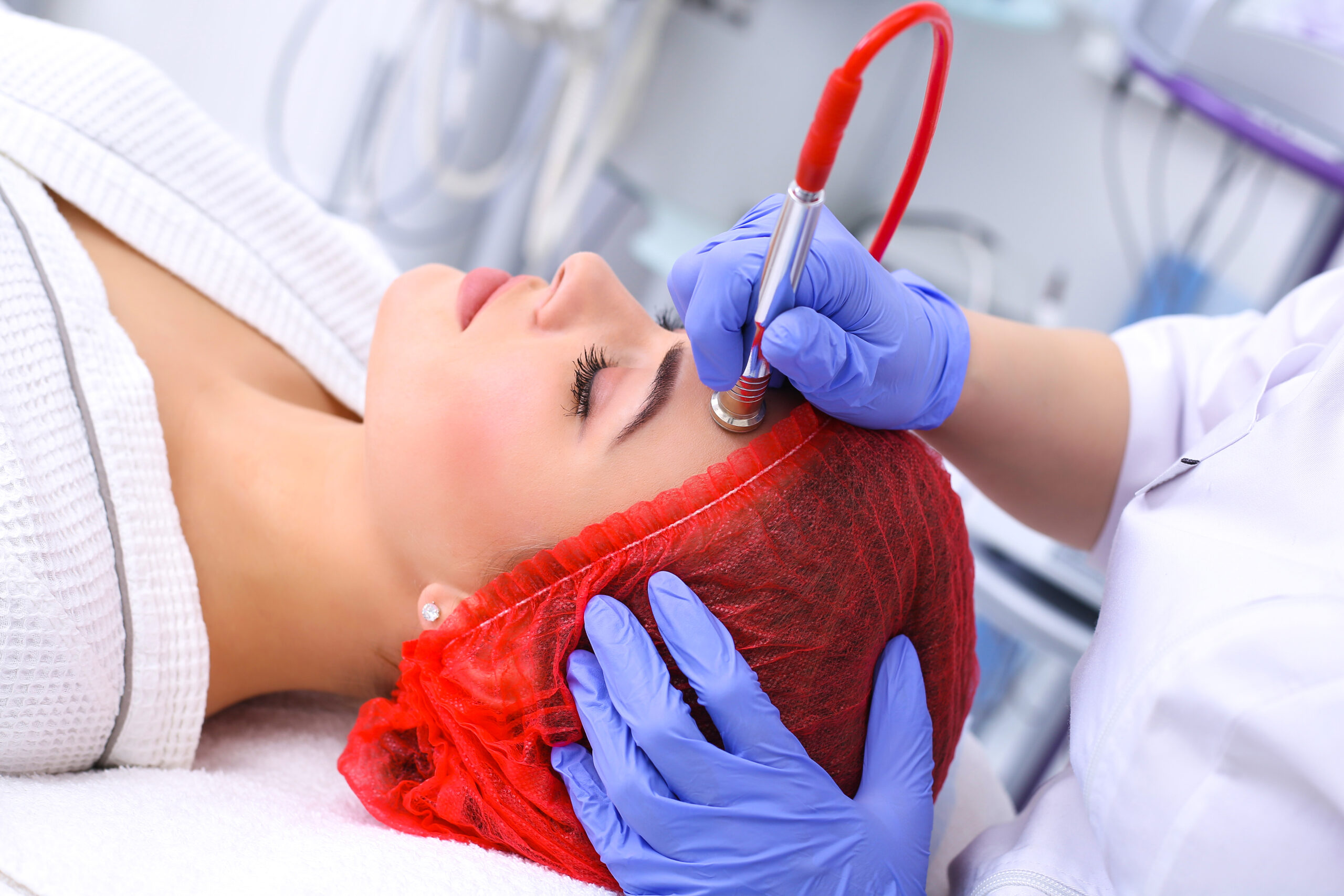 Procedure of Microdermabrasion. Mechanical Exfoliation, diamond polishing. Model, close-up. Cosmetological clinic. Medical equipment. Healthcare, clinic, cosmetology